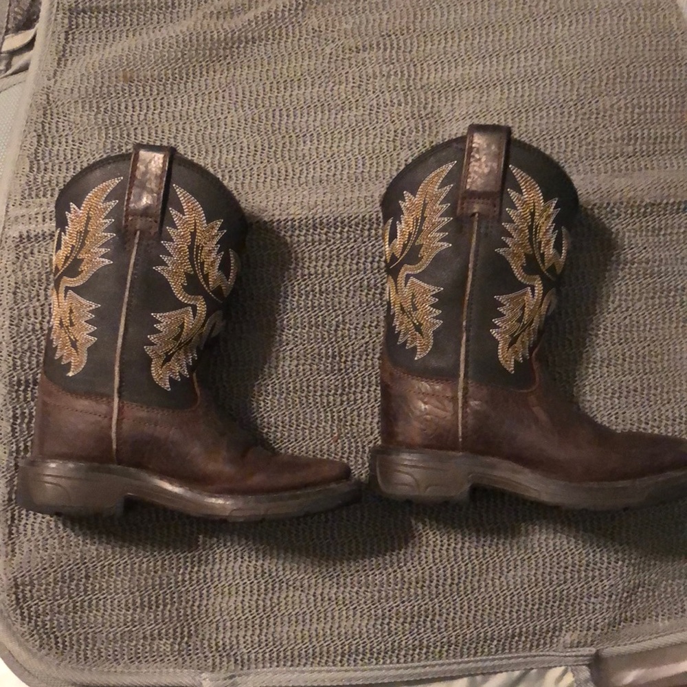 Toddler size 3 Ariat brand cowboy boots. Some normal wear on the toe.